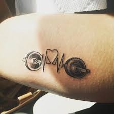 60 Tattoo Ideas For The Fitness Obsessed Inspirational Tattoos Dumbbell Tattoo Tattoos For Daughters