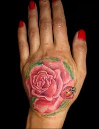 Rose tattoos, rose tattoo designs, rose tattoo ideas, best and beautiful rose designs and ideas for men and women, check out cool and latest. Bug With Rose Tattoo On Girl Hand