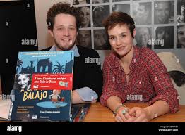 Actress Cecile de France and cartoonist Thomas Baas attend the 'Salon du  Livre' (Paris Book Fair) held at the Porte de Versailles in Paris, France, 