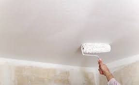 Complete Guide To Painting Popcorn Textured Ceilings Homeadvisor In 2020 Painting Popcorn Ceiling Ceiling Texture Textured Wall Paint Designs