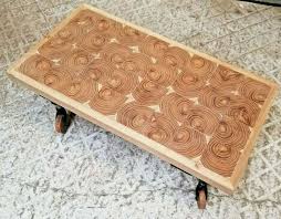 Table top and wheels are made to have the distressed appearance. M1271 Coffee Table With Wheeled Legs Made Using Wood End Grain Blocks In Antique Coffee Tables