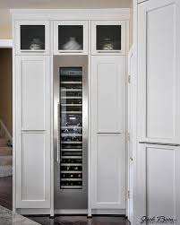 jack rosen custom kitchens modern kitchen with chrome accents wine fridge white contemporary tall bench island