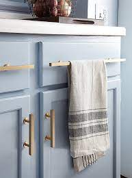 Chic Ways To Easily Update Drawer And Door Hardware In Your Home Hunker Blue Kitchen Cabinets Stylish Kitchen Trending Decor