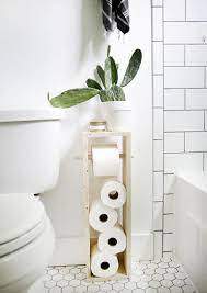 Small bathroom toilet roll storage ideas. Diy Storage Solutions 7 Simple Affordable Solutions From The Merrythought Diy Toilet Paper Holder Toilet Paper Stand Toilet Paper Storage