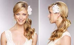 Low Side Ponytail With Flower Side Ponytail Wedding Bridesmaid Hair Wedding Hairstyles Updo