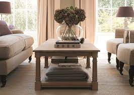 With its curving smoked glass top and blocky white base, this creative coffee table makes a decorative statement. Extra Large Wooden Coffee Table Neptune
