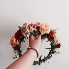 The Marcella Crown Peach And Burgundy Ranunculus Spiral Eucalyptus And Blush Spray Roses Www Thecrowncollective C Flower Crown Wedding Crown Peach Flowers