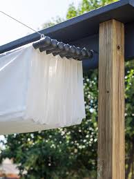 One of the easiest diy patio shade ideas is a fabric canopy. How To Build An Outdoor Canopy Hgtv