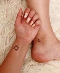 Sun and moon tattoo is one of the most popular tattoo designs among couples. Sun And Moon Matching Tattoos Sun Moon Tattoo Bestfriendtattoos Matching Small Minimalist Subtle Tattoos Beautiful Small Tattoos Matching Tattoos