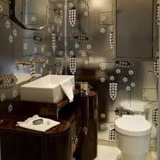 White bathrooms and ensuites are a common look in modern homes, as white makes the bathroom space look more clean, polished and elegant. 33 Dark Bathroom Design Ideas Shelterness