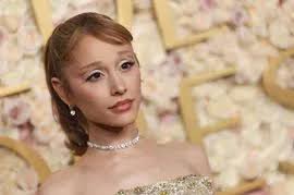 Noel Gallagher's wife embraces rockstar ways and swears leaving club with  his daughter