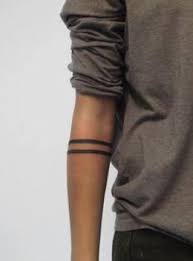 The oh, so simple band tattoo comprises of a couple of lines wrapping all the way around the arm and is always only located in this area. Spotlight On Armband Tattoos And Their Meanings Easy Ink