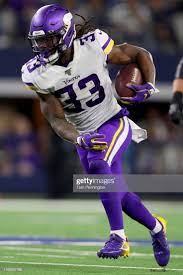 Dalvin Cook Of The Minnesota Vikings Carries The Ball Against The Minnesota Vikings Nfl Vikings Vikings
