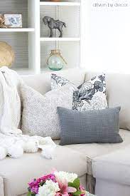 Working your way toward the middle, place your two medium pillows next to. Pillows 101 How To Choose Arrange Throw Pillows Driven By Decor