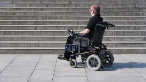 Power wheelchairs can be a great way for people with limited mobility to get around. Disabled Person In An Electric Stock Footage Video 100 Royalty Free 5014382 Shutterstock