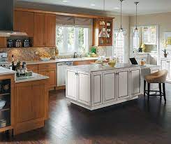Some of the best kitchen trends 2020 are those that fill your. Maple Wood Cabinets With White Kitchen Island Homecrest
