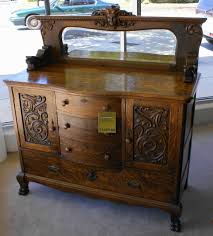 Description Solid Oak Hand Carved Medium Oak Bow Front Center Buffet With Attached Beveled Mirror And Paw Victorian Furniture Antique Furniture Antique Buffet