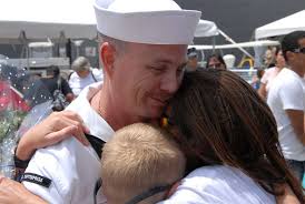 Petty Officer 1st Class (SW) Brian Greenlaw from USS