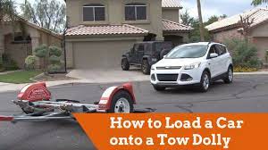 Download high quality royalty free car hauler stock footage from provideofactory. How To Load A Car Onto A U Haul Tow Dolly Youtube