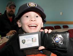 Little police chief: Rochester boy with cancer named honorary Somersworth  officer