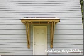 Metal roofs can be installed over your existing roof without tearing off shingles, provided local building codes allow it. House Renovations Week 10 Building A Door Roof Or How Awesome Is My Daddy Southern Hospitality