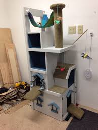 A fun and simple diy cat litter furniture project is to convert a tall dresser into a place to hide the. Cats And Their Tough Workload Ahead Of Them Diy Cat Tree Cat Tree Cat Diy