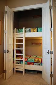 How to make a queen loft bed with desk for a small room a friend of ours recently purchased a new home for his family. The One House Outside Tennessee Yes Those Are Bunkbeds In A Closet My Mom Says People Just Can T Stop Talk Closet Beds Unique Built Ins Creative Kids Rooms