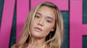 Olivia Ponton Dazzles in Figure-Hugging Pink Satin Gown in New York City