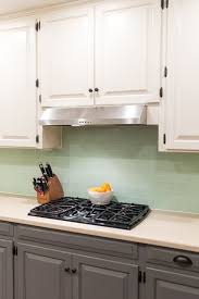 These are not stock photos, but kitchens completed by our own craftspeople. Seafoam Green Tile Backsplash Kitchen Redo Green Tile Backsplash Green Backsplash