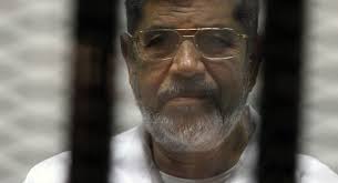 Former Egypt President Mohamed Morsi Dies After Fainting in Courtroom at  Age 67