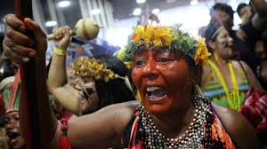 A grieving indigenous community is offering a rare reward for information into the suspicious death of a young mother. Brazil S Indigenous Women Protest Against Bolsonaro Policies Bbc News