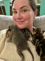 So do I automatically get my official Cat Lady membership card in the mail  or do I have to fill out an application?