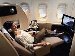 Qantas A380 First Class Suites Each Cosy Cocoon Like Suite Features An Expertly Designed Sea Flying First Class Business Class Flight Business Class Tickets
