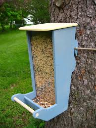 Items Similar To Bird Feeder On Etsy Bird Feeder Note The Way It Attaches To The Tree Cord Can Be Loosened As The Tree 2020 Kus Yemlikleri Kus Evi Ahsap Isleri