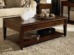A mix of metal and wood, this cocktail table is a sturdy addition to any living room. Hammary Sunset Valley Coffee Table Collection
