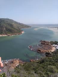 Will south africa's tertiary fees crisis ever be solved? Knysna Heads Is A Famous Landmark Along The South African Garden Route A Pair Of Cliffs Spectating The Ocean From The Knys Africa Travel Travel Moments Knysna