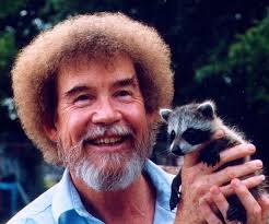 Bob Ross holding a baby raccoon. He had a passion for rescuing sick and  injured animals.