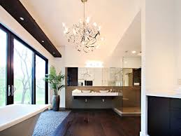 Nice bathroom with natural stone tiles and wood cabinet. Stunning Modern Bathroom With Dark Hardwood Floor Hgtv