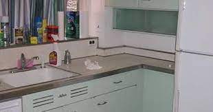 Clean it well from all the greasy that built in during years of using. How To Refinish Metal Kitchen Cabinets Hunker Metal Kitchen Cabinets Metal Kitchen Kitchen Design