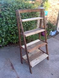 Diy ladder shelf with kind of a coffee table. Pallet Wood Painter S Ladder Shelf Ana White