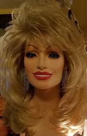 Corn silk hair and big brown eyes, how you make me smile. Dolly Parton Wigs From Dolly S Secret Collection Style Dolly S Own Shown In 23d Blonde Bombshell From Dollys Dolly Parton Wigs Long Hair Styles Hair Makeup