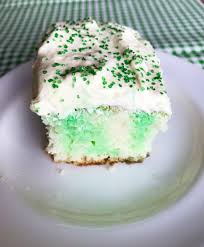 In separate bowls, add 1 cup boiling water to each flavor dry gelatin mix. St Patrick S Jell O Poke Cake The Gingham Apron