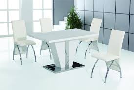 This modern dining table's unique, architectural design gives the illusion of a floating top. Costilla Dining Table White With Stainle Buy Online In Guam At Desertcart