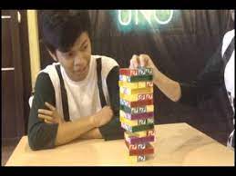 How To Play Uno Stacko Uno Board Game Cafe Mainan