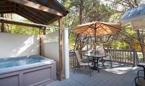 Cabins with indoor and outdoor hot tubs. Wimberley Texas Hill Country Cabin Rentals Cypress Creek Cottages