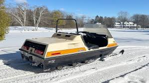 Image result for Orange 1973 Snowmobile