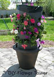 How To Make An Easy Flower Tower Vertical Garden For Your Porch Patio Or Backyard Flower Tower Diy Garden Container Gardening