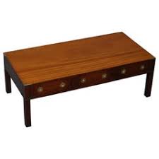 Featuring curved legs in the traditional opium style, it is the perfect centerpiece for your living room. Solid Mahogany Coffee Tables 9 For Sale On 1stdibs