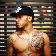 Hamilton taught darius many important tasks like how to tie his shoes and brush his teeth. Celebritattoo Lewis Hamilton Lewis Hamilton S Lion Tattoo By