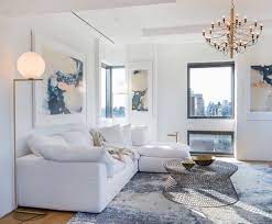 Brown leather ottoman also serves as a. Cozy Bright White Living Room Decor With Comfy Sectional White Living Room Decor Elegant Living Room White Sofa Living Room